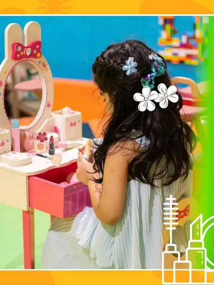 A little pampering session at our pretend-play vanity. It's one of the many creative play stations we have for kids to explore.
