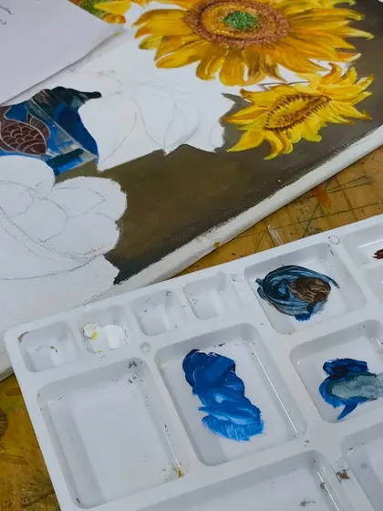 A work in progress. This image shows the initial layers of an acrylic painting, with the background and first colors blocked in before details are added.