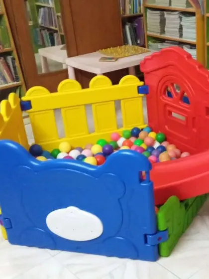Our bear-themed ball pit and slide are perfect for our youngest members. It's a safe and fun spot for toddlers to play and burn off some energy between stories.