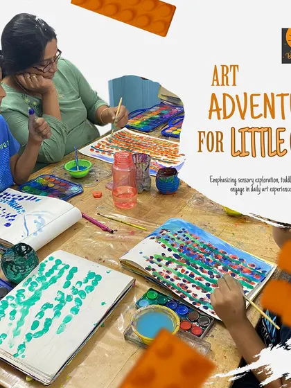 Our art adventure classes emphasize sensory exploration and daily engagement. Here, students are learning pointillism, a fun technique that teaches them about color mixing and creating texture with dots.