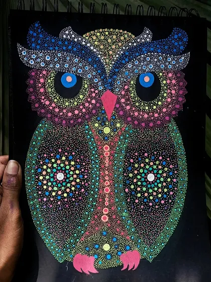 A colorful dot art owl, a species that is often misunderstood but beautiful.