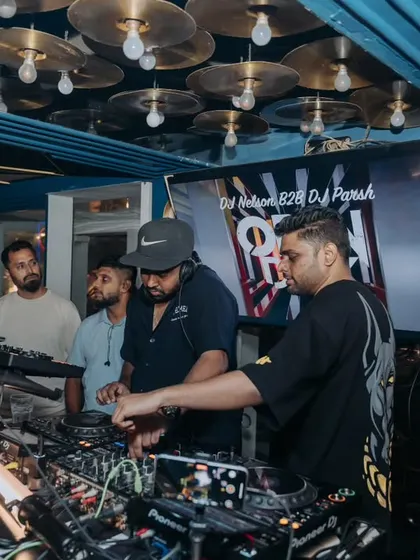 Another angle of our B2B session, showing the full setup with multiple laptops and decks required for a collaborative performance.