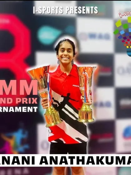 Janani Anathakumar stands victorious with her dual championship trophies at the AMM Grand Prix Tournament, a showcase of her excellence.