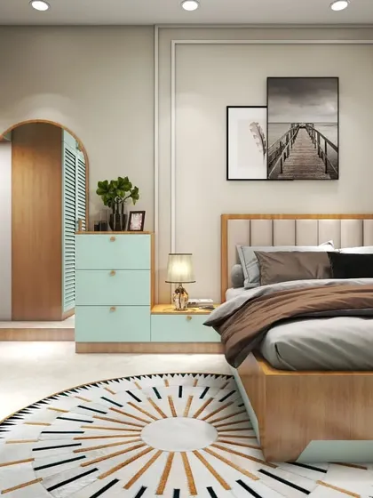 A cozy bedroom design featuring louvered cabinet doors in a soft mint green. The room includes a bed, a dresser, and a TV unit, all designed in a cohesive and charming style.