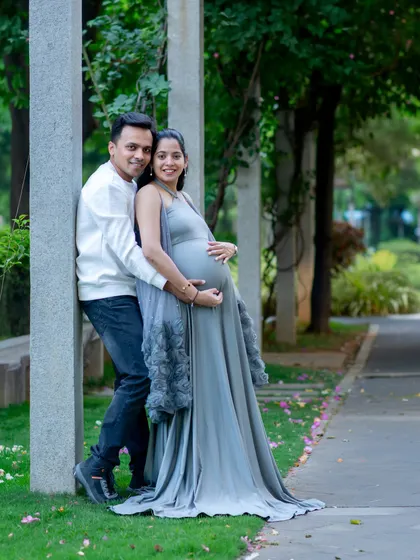 A full-length portrait of a couple during their outdoor maternity session. We guide our clients into comfortable poses that feel natural and loving.