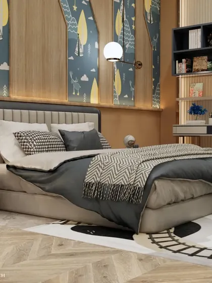 The bed area features a custom headboard and a fun, train-track-themed rug. The mix of patterns and textures, from the wallpaper to the bedding, creates a visually engaging and cozy environment.