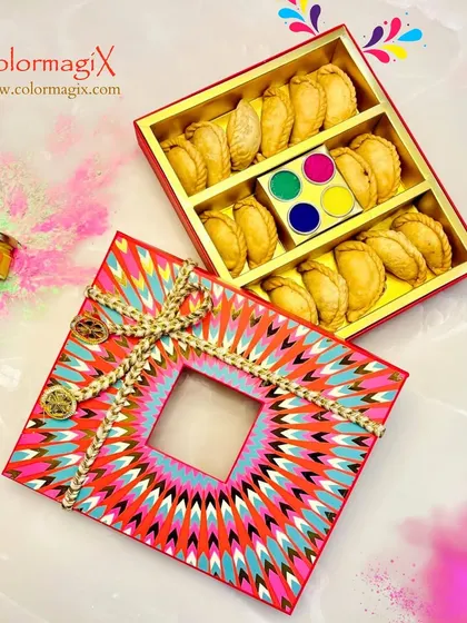 A duplicate of image 66, showcasing the vibrant and creative packaging of our Holi Special Gujiya Box. It's a perfect blend of tradition and modern design.
