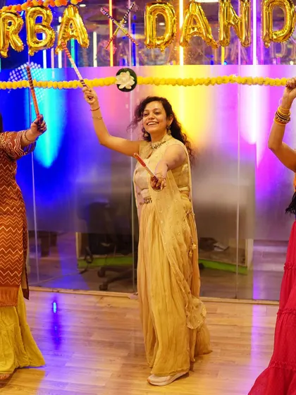 The festive atmosphere of our Garba night, with colorful lights and energetic dancers. We can help recreate this for your own pre-wedding party.