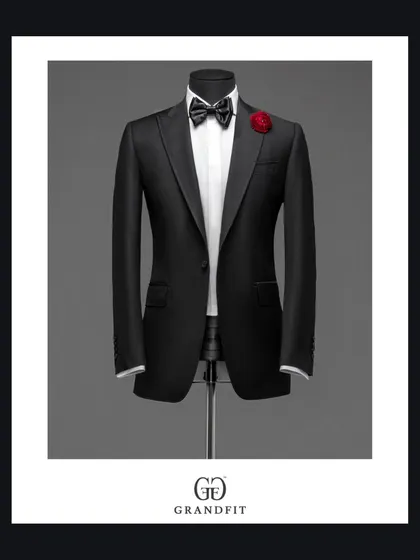 The tuxedo as a work of art. This studio shot on a mannequin highlights the architectural lines, from the sculpted shoulders to the sweep of the lapels.