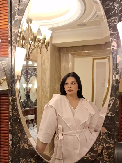 A moment of self-reflection. This outfit, a structured trench-style top, is a statement in authentic, personal style.