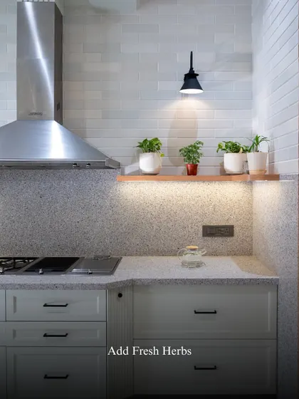 When styling kitchen shelves, I think of them as little stages for everyday joy. Adding fresh herbs brings life and fragrance to the space, keeping inspiration close at hand.