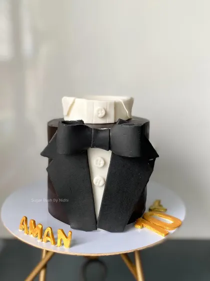 A sharp and stylish tuxedo cake for a true gentleman. This cake is perfect for birthdays, promotions, or any event that calls for a touch of class.