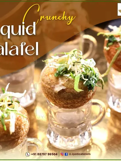 A creative take on pani puri, this Crunchy Liquid Falafel is served in shot glasses. The liquid base is topped with a crispy falafel ball for a surprising burst of flavour and texture.