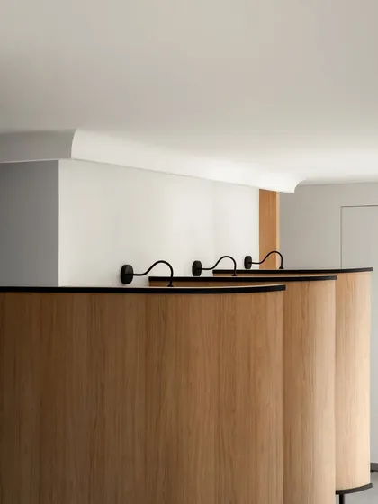 These recovery pods at Sculpta Clinic offer patients a private space to relax and recover. The thoughtfully integrated wooden screens provide a balance of openness and seclusion, where functionality meets luxury.
