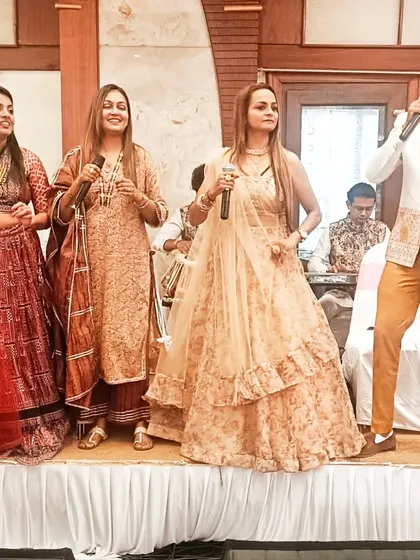 My team of talented female and male singers performing live at a wedding.