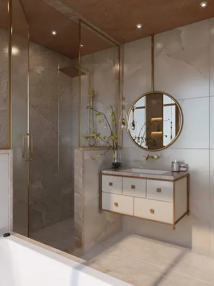 A view of the walk-in shower and bathtub, showcasing the elegant combination of marble, glass, and gold-finished hardware.