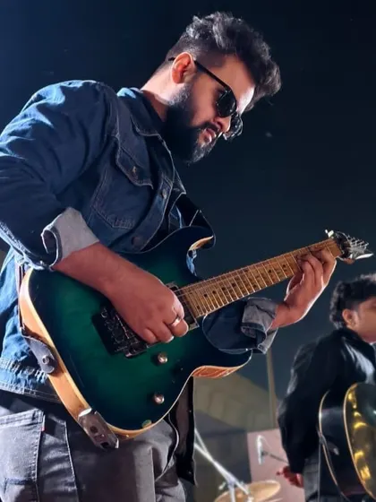 From classroom practice to stage performance, we guide our students every step of the way. This is one of our advanced students showcasing their skills on the electric guitar, a popular choice in our Western music curriculum.