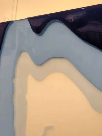 Another detail shot of the Mumbai map, showing the layered effect of the different shades of blue resin, which represent the water surrounding the city.