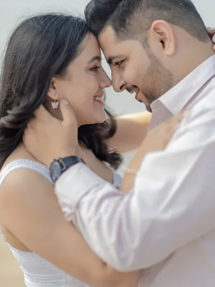A close-up shot capturing the smiles and intimacy between a couple. These tight frames focus purely on the emotion and connection you share.