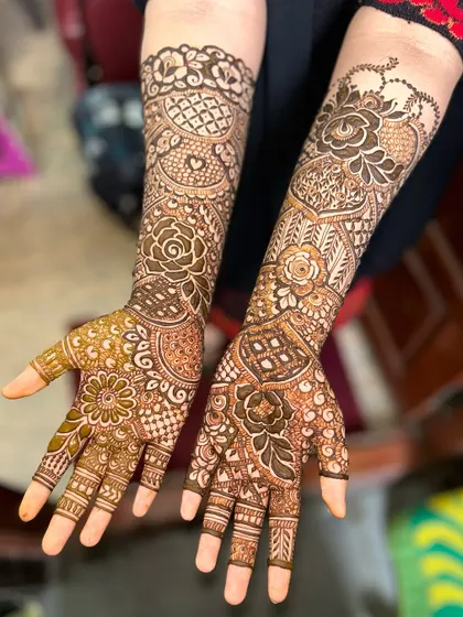 A full view of a beautiful non-bridal design, featuring a mix of florals and traditional patterns.