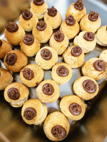 A tray full of freshly filled chocolate choux pastries. These were part of a large Diwali order, and I'm so grateful for my hardworking team that makes it all possible.