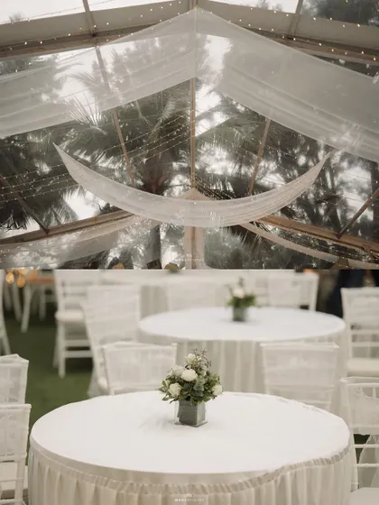 A duplicate of 173, highlighting the simple yet beautiful centerpieces and the airy feel of the reception space.