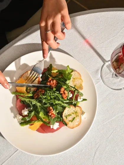 My Poached Red Wine Pear Salad is a work of art. The sweetness of the pear balances the bitterness of the greens and the saltiness of the feta.