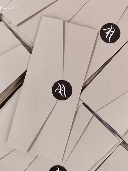 Simplicity at its finest. These custom wedding invites feature a clean, modern design with a custom monogram sticker sealing the unique fold. The Colombo cream color adds a touch of warmth and sophistication.