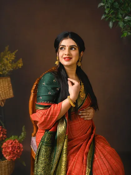 A lovely close up capturing the mom to be's happy expression and beautiful traditional jewelry. This is a celebration of both motherhood and heritage.