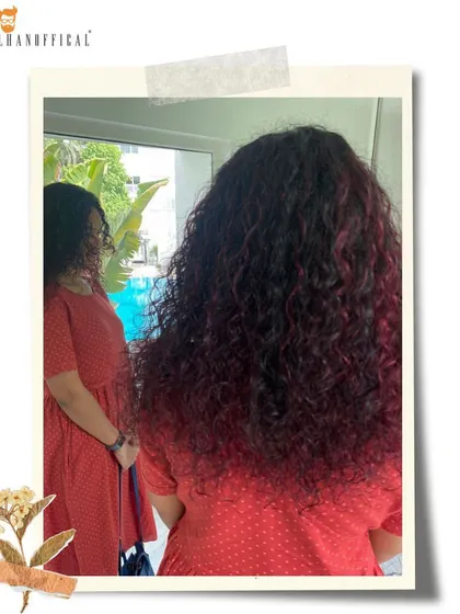 Who says you can't have bold color on curly hair? I love challenges like this, creating a captivating deep red magenta that makes every curl pop while keeping the hair nourished and defined.