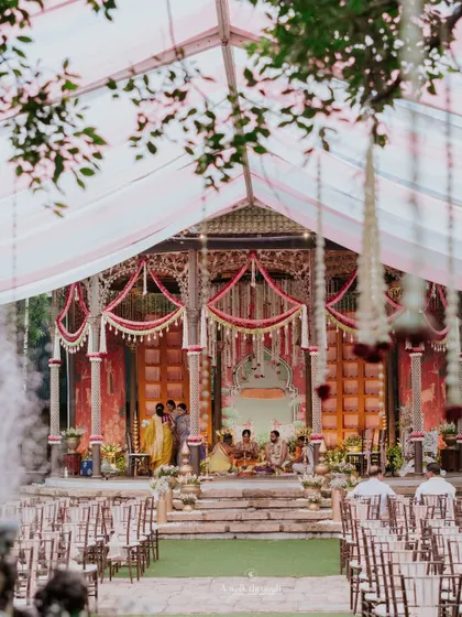 The family gathered on stage during the naming ceremony. The decor is designed to be beautiful from all angles, including the perspective of the seated guests.