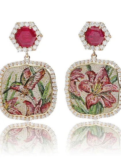 A clean, studio shot of the "Promise of Eden" earrings. This view highlights the asymmetry and storytelling aspect of the design, with the hummingbird and lily captured in detailed micromosaic.