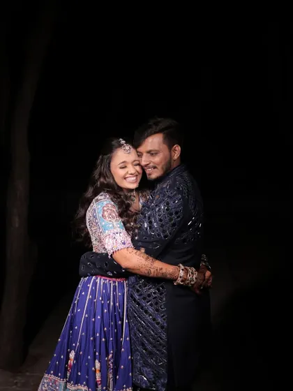 A sweet embrace between the couple.