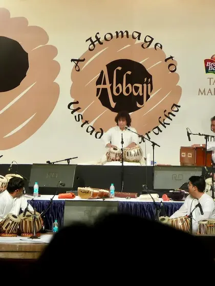 A wide shot of the stage during the 'Homage to Abbaji' concert. I feel immense gratitude to have been a part of these events, sharing the stage with so many talented disciples of the Punjab Gharana.