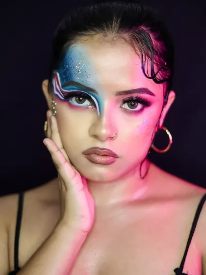 A portrait of the abstract look, showing how the colors blend and contrast on the skin.