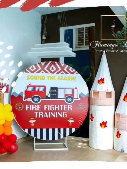 The 'Fire Fighter Training' zone, marked with a custom sign and featuring castle turrets 'on fire'.