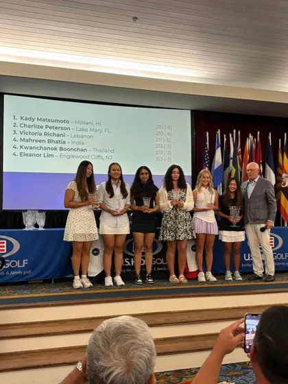 Our student Mahreen Bhatia on stage with other top finishers at the US Kids World Teen Championships in Pinehurst, USA. She secured a commendable 4th place, representing our academy with distinction.
