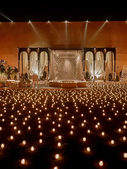 Signature lighting is one of our hallmarks, as shown in this breathtaking Sufi night setup. We created a sea of light with hundreds of individual candles, leading to an ethereal stage that feels both grand and deeply serene.