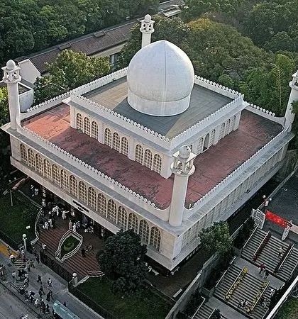The Kowloon Mosque in Hong Kong, which we designed in 1984. It is the largest mosque in the city, featuring traditional Islamic architecture with four minarets and a white marble facade, serving as a vital spiritual and community center.