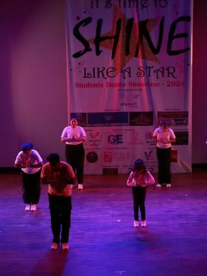 A moment of perfect synchronization as our students bow at the end of their performance.