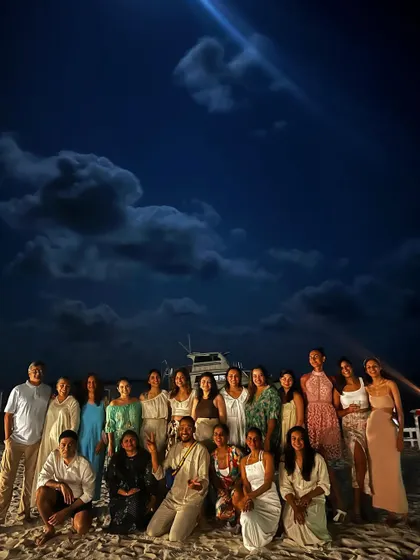 Our last supper together on the beach under a dramatic night sky. We celebrate the week's experiences, the new friendships, and the peace we've cultivated.