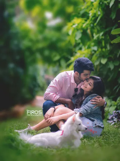 Another angle of the couple and their dog, showing their loving interaction. These are the candid, happy memories that make a pre-wedding shoot so special.
