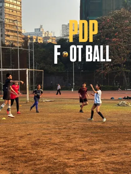 This action shot shows our players in the middle of a dynamic drill. We use a variety of exercises to keep training sessions exciting and effective, ensuring kids are always learning and moving.