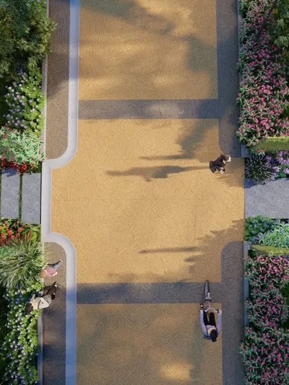 An aerial 3D render of the main road for our Sakleshpur project. This top-down view helps visualize the relationship between the hardscape, such as the paved road, and the softscape, including the lush, colorful planting beds that line it.