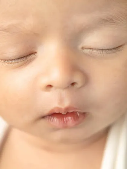 A close up of a newborn's perfect little lips. I focus on capturing these fleeting details that parents will treasure forever.