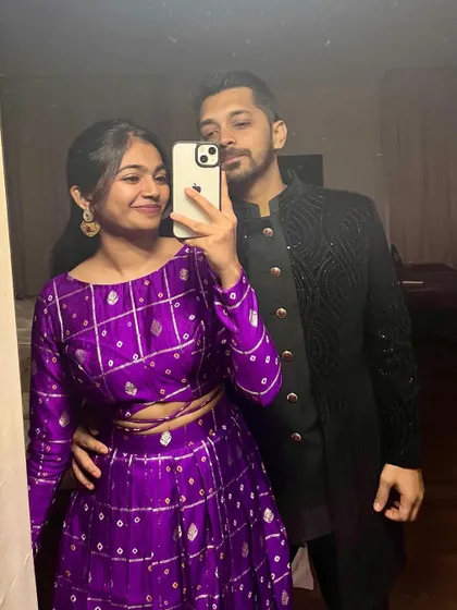 A lovely selfie from our client wearing her purple bandhini crop top and skirt set. It’s a versatile outfit perfect for any festive occasion.