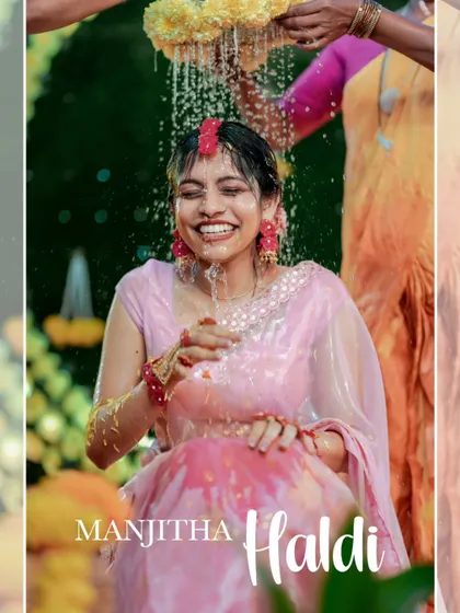 A poster-style image from a Haldi ceremony, capturing the bride's ecstatic smile as she is showered with water and flowers.