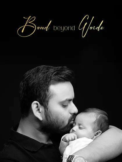 A bond beyond words. This powerful black and white portrait of a father kissing his newborn's head is a timeless and emotional keepsake from those precious early days.