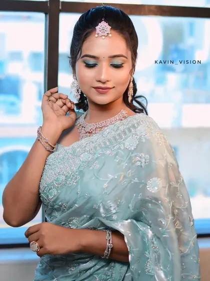 A delicate and elegant American Diamond set, perfect for pairing with a pastel-colored saree or gown for a sophisticated party look.