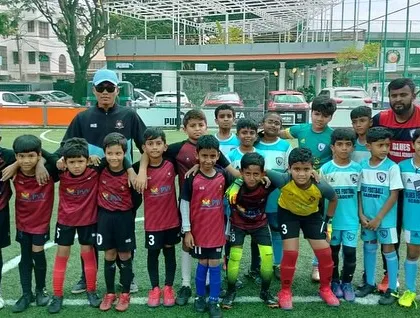 The U-9 team and their opponents after the WSM Blue Cubs League final. Sportsmanship and respect are values we cherish.